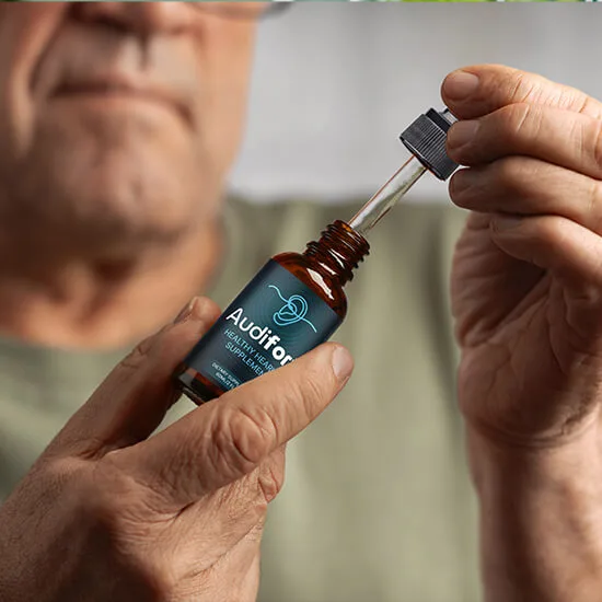 an elderly person using the Audifort product